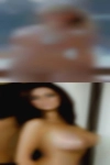 Naked girls having other girls